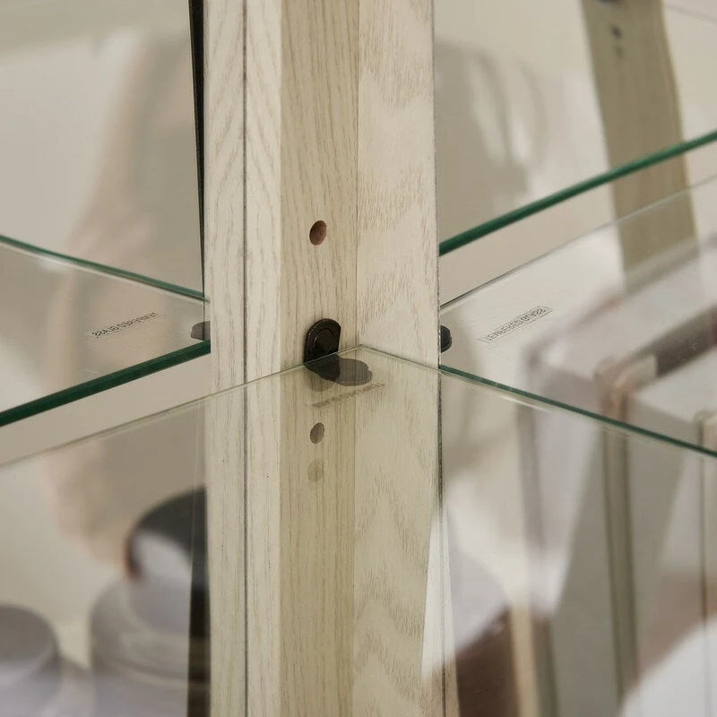 Meuble d'angle blanc avec portes vitrées et éclairage intégré, montage par 1 personne