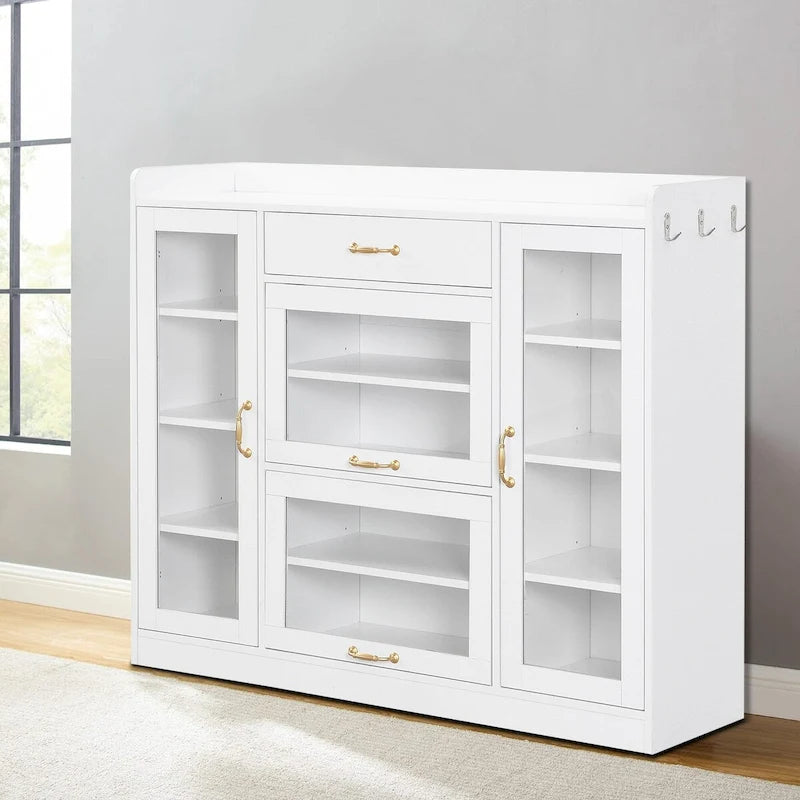 Meuble de rangement pour chaussures blanc et noir avec portes vitrées et poignées dorées