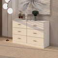 Commode blanche à 2 colonnes et 6 tiroirs avec poignées dorées